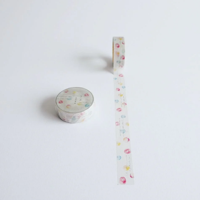 YOHAKU washi tape titled 'Brilliance' (Y-073), featuring watercolor-like dots in soft pink, blue, and yellow with delicate script accents, ideal for creative journaling, scrapbooking, and decorative projects.