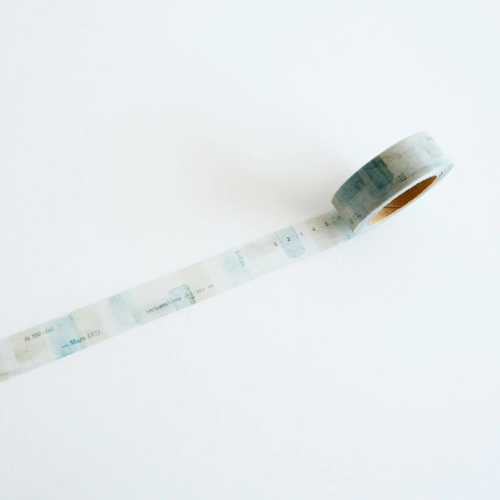 YOHAKU washi tape titled 'Secret Water' (Y-125), featuring a collage of muted blues, greens, and beige with vintage-style typed letters and numbers, ideal for adding a subtle, artistic layer to crafts, journals, and scrapbooks.