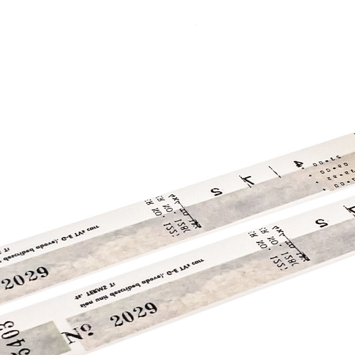 YOHAKU washi tape titled 'Hiiro' (Y-016), featuring a monochrome collage design in black, white, and grey, ideal for adding a sleek, modern touch to journals, planners, and artistic projects.