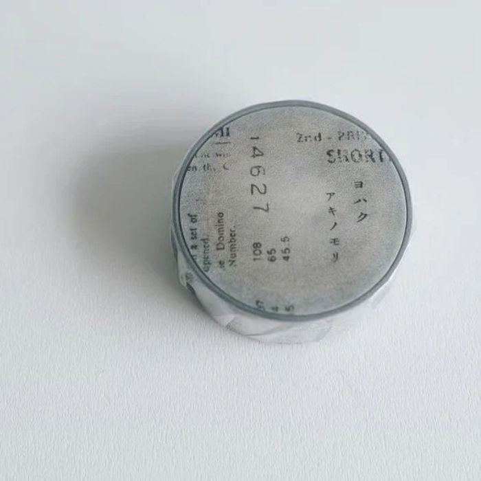 YOHAKU washi tape titled 'Akinomori' (Y-116), featuring a beautiful soft grey collage design, Japanese stationery perfect for adding a sophisticated themed touch to planners, journals, and crafts.