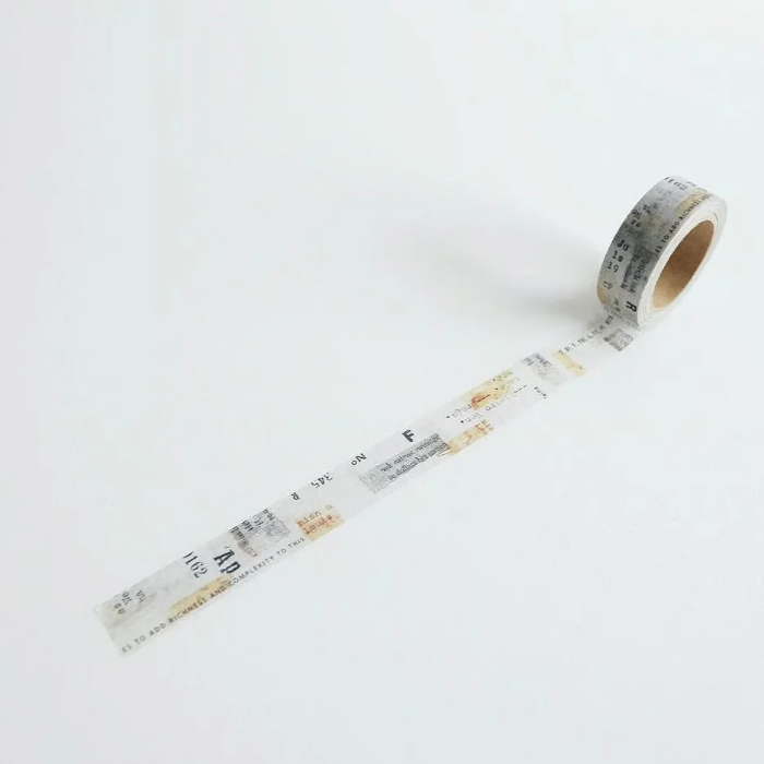 YOHAKU washi tape titled 'Collage' (Y-009), featuring a beige and soft grey background with numbers and typed lettering for a vintage, minimalist style, perfect for enhancing journals, planners, and creative collages.