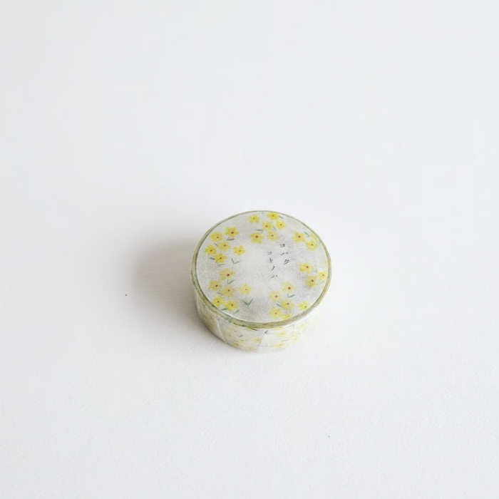 YOHAKU washi tape titled 'Kotonoha' (Y-140), featuring beautifully delicate floral designs in soft yellow hues, Japanese stationery perfect for adding a gentle, botanical touch to planners, journals, and crafts.
