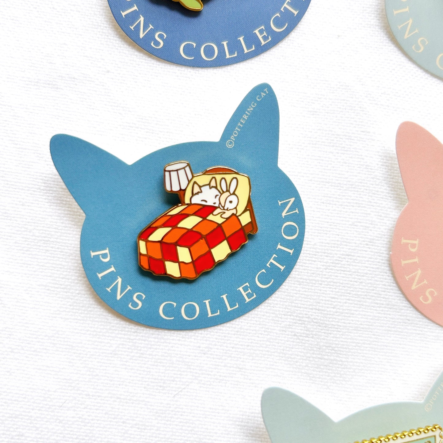 Pottering Cat Enamel Pin - Bed