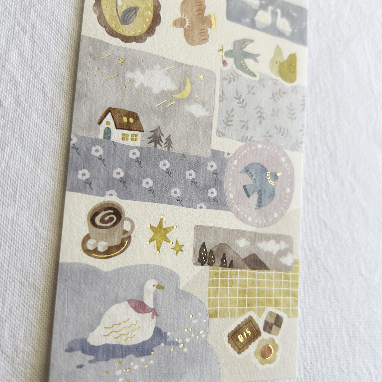 Mind Wave Lampo - Birds and The Starry Night Sky sticker sheet. Perfect for adding a touch of nighttime magic to journals, planners, and scrapbooks.