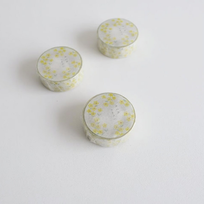 YOHAKU washi tape titled 'Kotonoha' (Y-140), featuring beautifully delicate floral designs in soft yellow hues, Japanese stationery perfect for adding a gentle, botanical touch to planners, journals, and crafts.