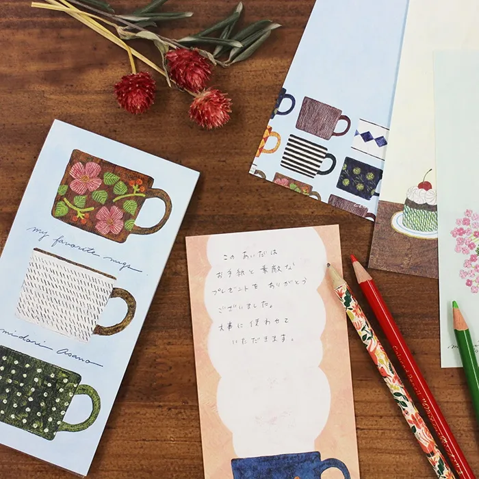 Midori Asano memo pad titled 'My Favorite Mugs,' featuring charming illustrations of various mugs and cups, Japanese stationery ideal for note-taking and decorating planners or journals.