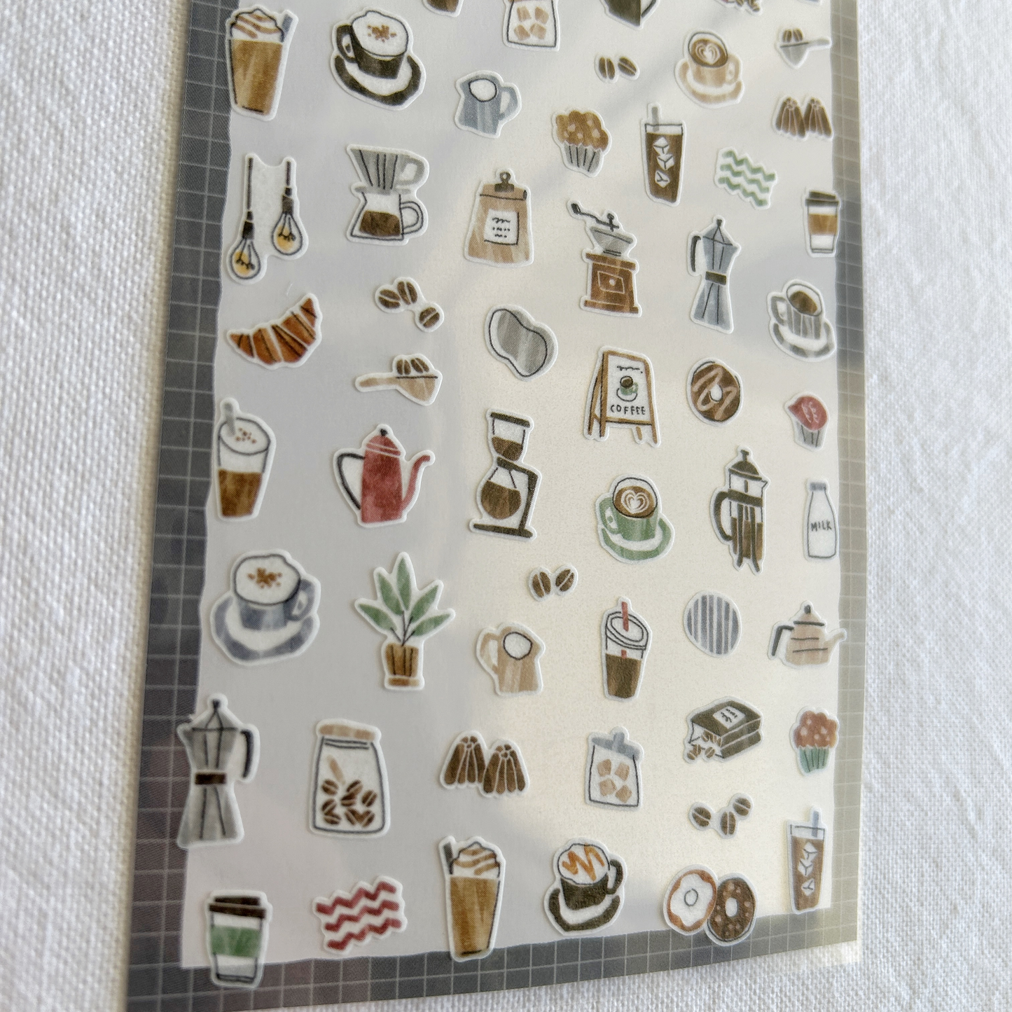 Mind Wave Cozy Sticker - Café. Ideal for decorating journals, planners, or scrapbooks.