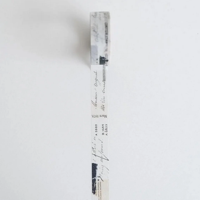 YOHAKU washi tape titled 'Moon and Star' (Y-121), a beige and black collage-style design Japanese stationery perfect for adding a to planners, journals, and crafts.