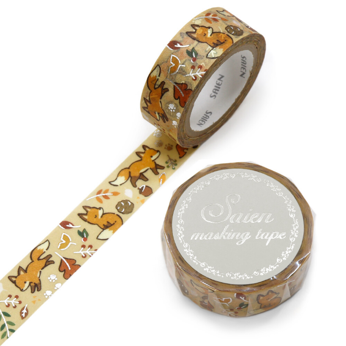 Featuring graceful foxes meandering through a forest floor scattered with vibrant fallen leaves, this design is accented with shimmering silver foil details that add a magical glow. Perfect for bringing the cozy beauty of fall to journals, planners, or gift wrapping.