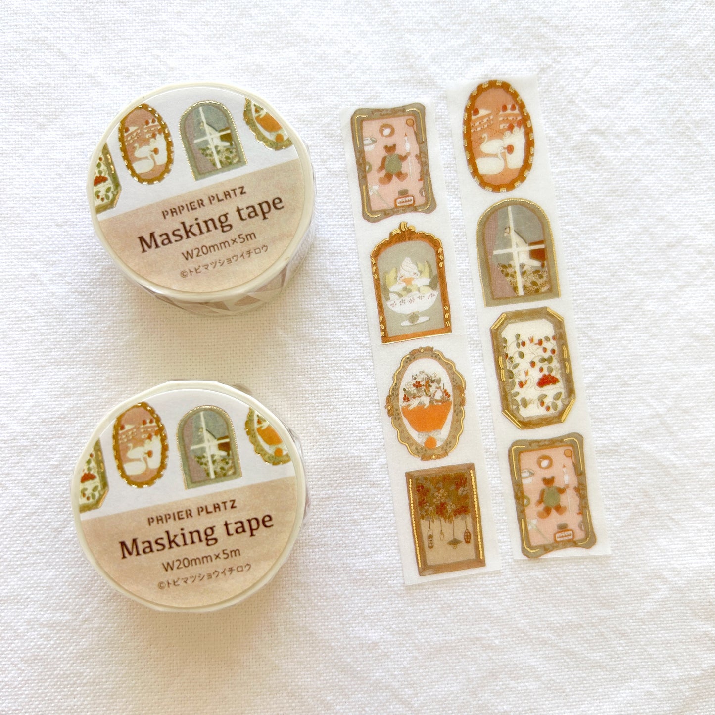 Washi tape with designs of framed artwork with animals