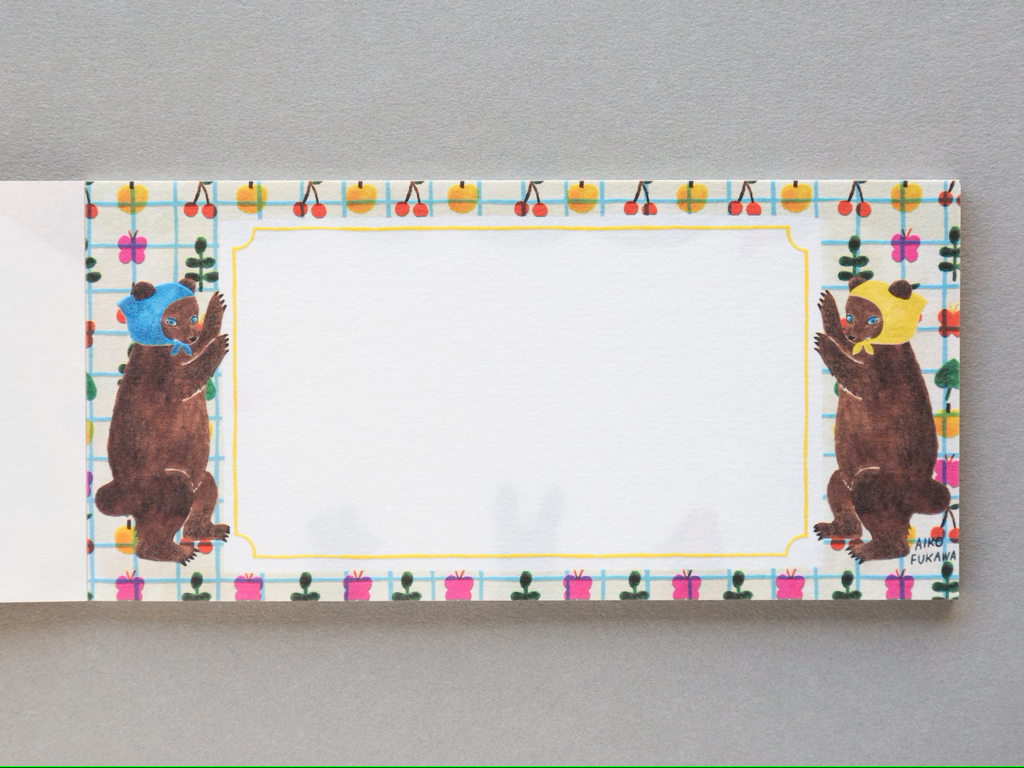 Aiko Fukawa memo pad titled 'Serendipity,' featuring playful, whimsical illustrations of animals and nature elements, Japanese stationery with an enchanting, artistic style.