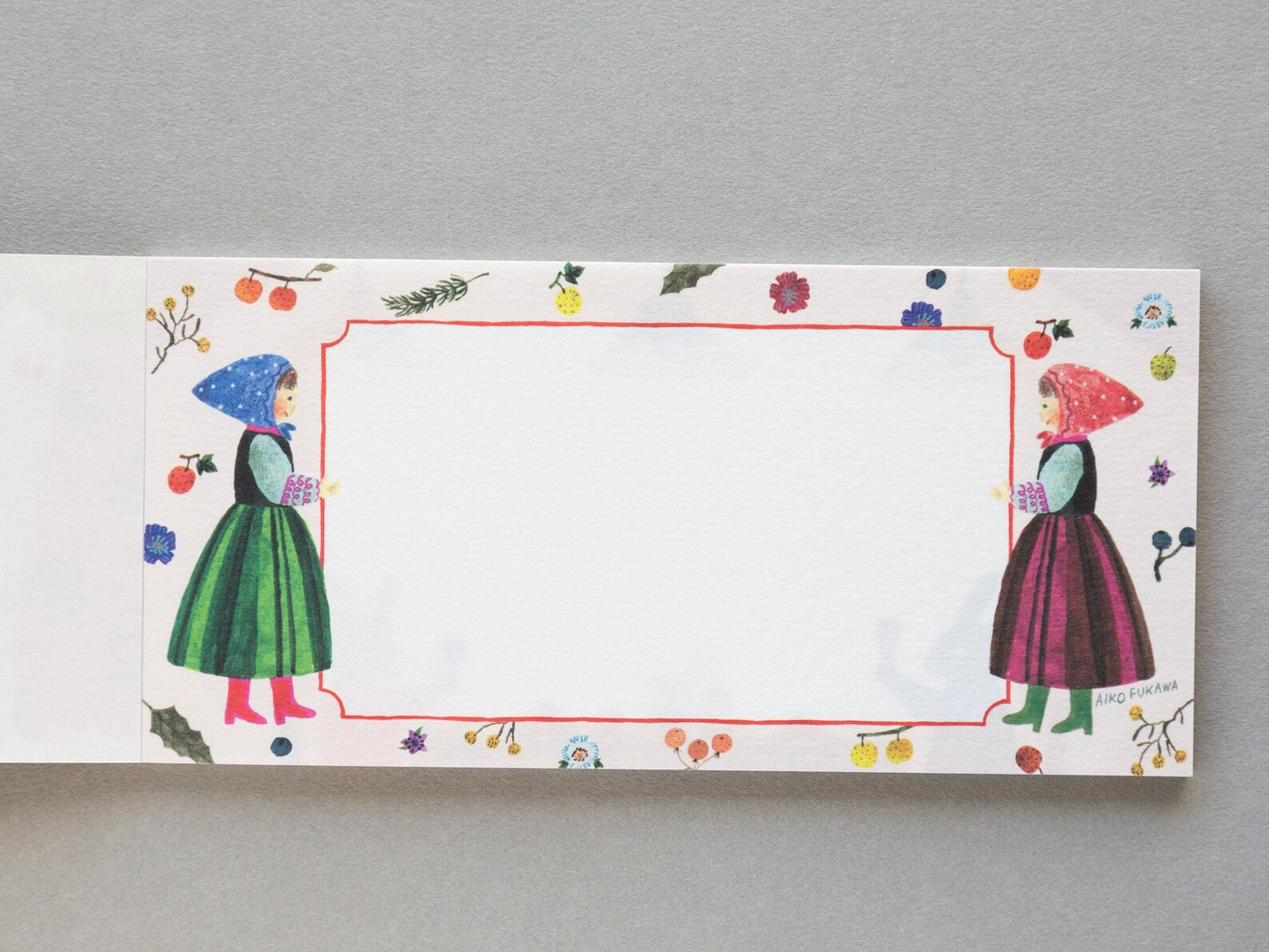 Aiko Fukawa memo pad titled 'Serendipity,' featuring playful, whimsical illustrations of animals and nature elements, Japanese stationery with an enchanting, artistic style.