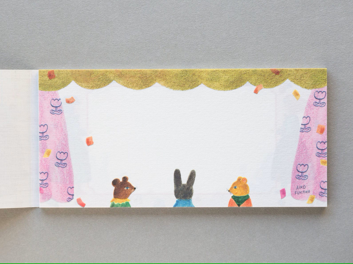 Aiko Fukawa memo pad titled 'Serendipity,' featuring playful, whimsical illustrations of animals and nature elements, Japanese stationery with an enchanting, artistic style.