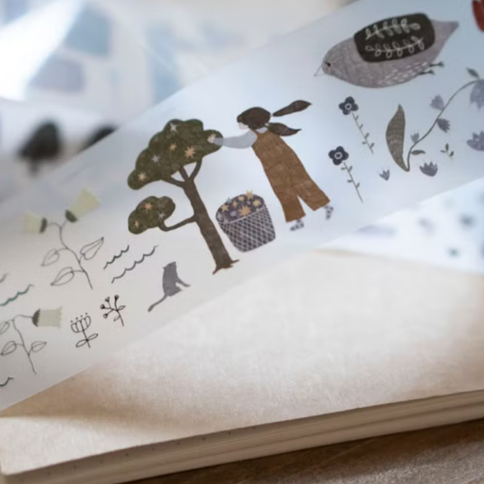 Ivy Snow matte PET tape titled 'In The Forest,' featuring whimsical forest-themed illustrations with animals, trees, and nature elements, Japanese stationery ideal for adding a nature-inspired touch to planners, journals, and crafts.