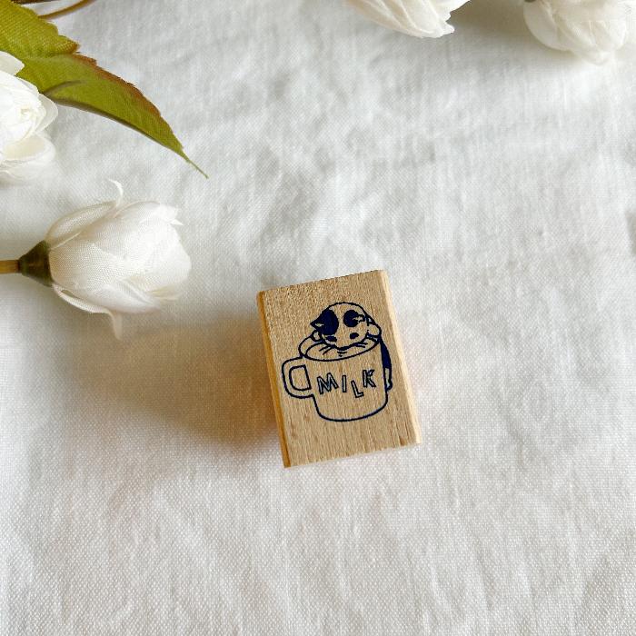 Pottering Cat rubber stamp titled 'Milk,' featuring the cutest little cat drinking milk from a large mug, Japanese stationery ideal for adding a playful, cozy touch to planners, journals, and crafts.