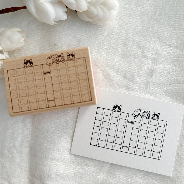 Pottering Cat rubber stamp titled 'Thesis Paper' featuring adorable cats peeking over a book, Japanese stationery perfect for marking completed projects or successes in planners, journals, and crafts.