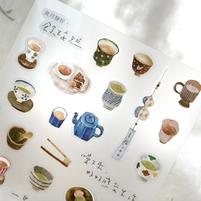 Pion transfer sticker titled 'Tea House,' featuring charming illustrations of teapots, teacups, and cozy tea-time scenes, Japanese stationery perfect for adding a warm, inviting touch to planners, journals, and crafts.