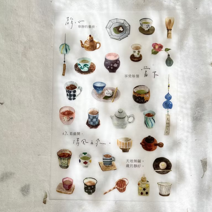 Pion transfer sticker titled 'Tea House,' featuring charming illustrations of teapots, teacups, and cozy tea-time scenes, Japanese stationery perfect for adding a warm, inviting touch to planners, journals, and crafts.