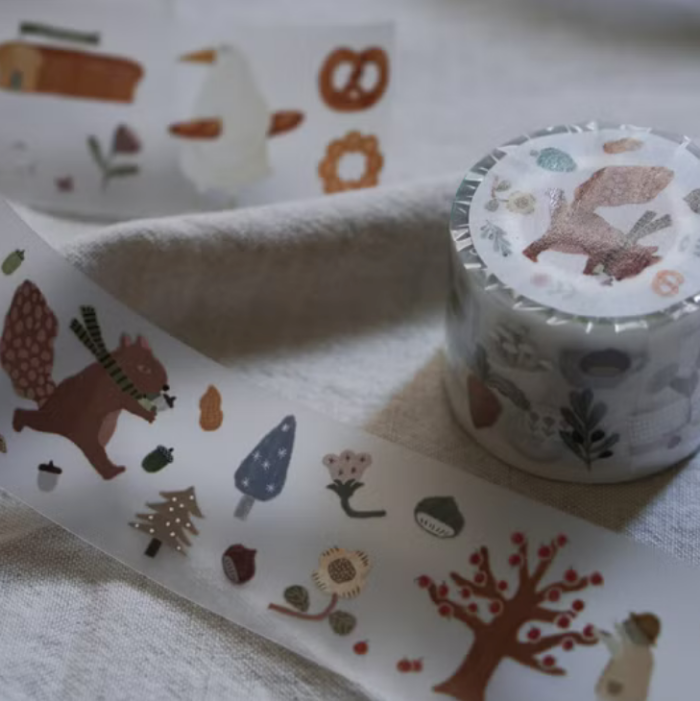 Ivy Snow matte PET tape titled 'The Forest Kitchen,' featuring charming illustrations of forest animals, fruits, and kitchen items, Japanese stationery ideal for adding a whimsical, nature-inspired touch to planners, journals, and crafts.