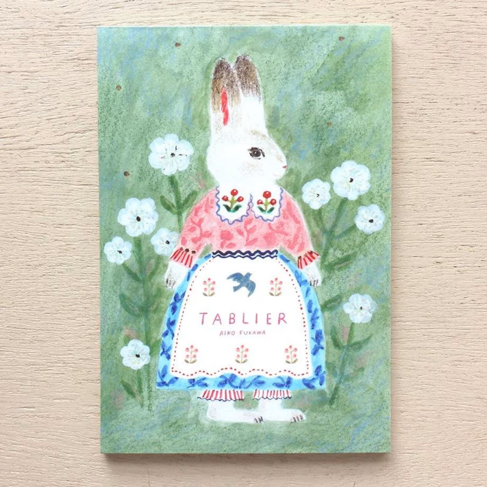 Aiko Fukawa postcard booklet titled 'Tablier,' featuring delightful illustrations of animals, flowers, and everyday scenes, Japanese stationery with a whimsical and artistic style.