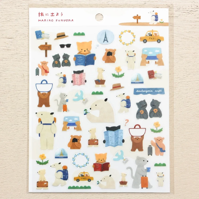 Mariko Fukuoka clear sticker sheet titled 'Let's Go On A Trip,' featuring playful travel-themed illustrations of luggage, maps, and cute characters, Japanese stationery perfect for decorating planners, journals, and scrapbooks.