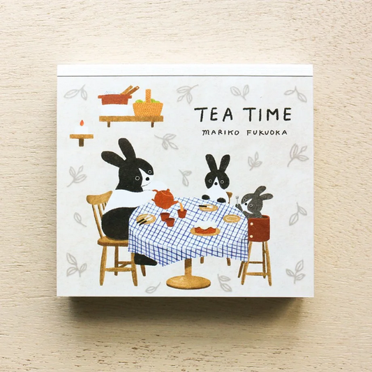 Mariko Fukuoka memo pad titled 'Tea Time,' featuring charming tea-themed illustrations with teacups, desserts, and cozy accents, Japanese stationery ideal for note-taking and decorating planners or journals.