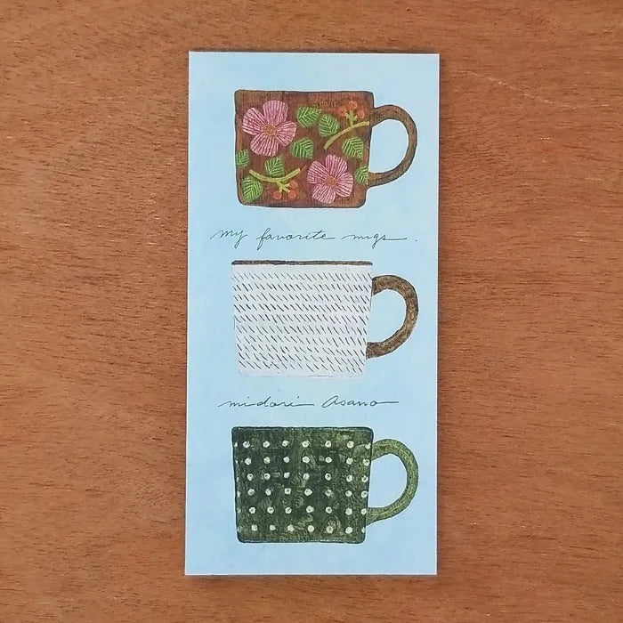 Midori Asano memo pad titled 'My Favorite Mugs,' featuring charming illustrations of various mugs and cups, Japanese stationery ideal for note-taking and decorating planners or journals.