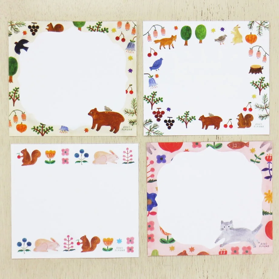 Aiko Fukawa memo pad titled 'Feel Nature,' featuring whimsical illustrations of animals, plants, and nature scenes, Japanese stationery with a soft, artistic style.