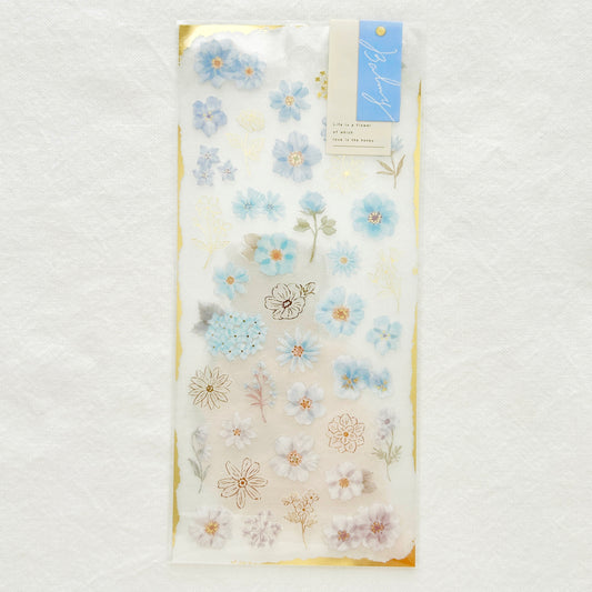 Sticker sheet with graceful blue flowers with gradient colors adorned with delicate gold foil details. 