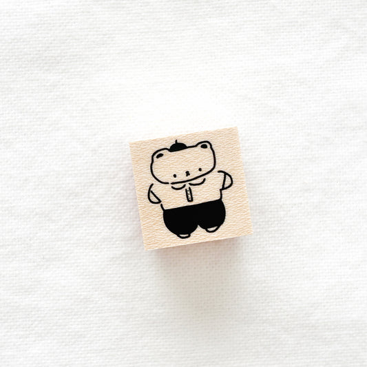 Small wooden stamp with cute bear wearing a hat