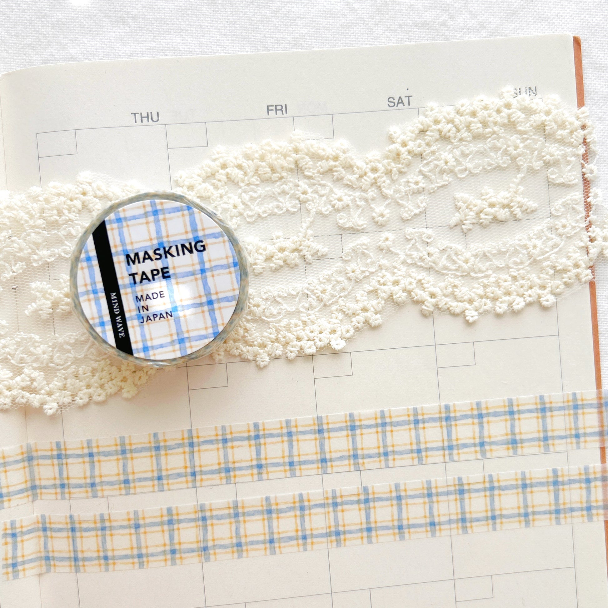 Washi tape with a blue and yellow check grid  pattern