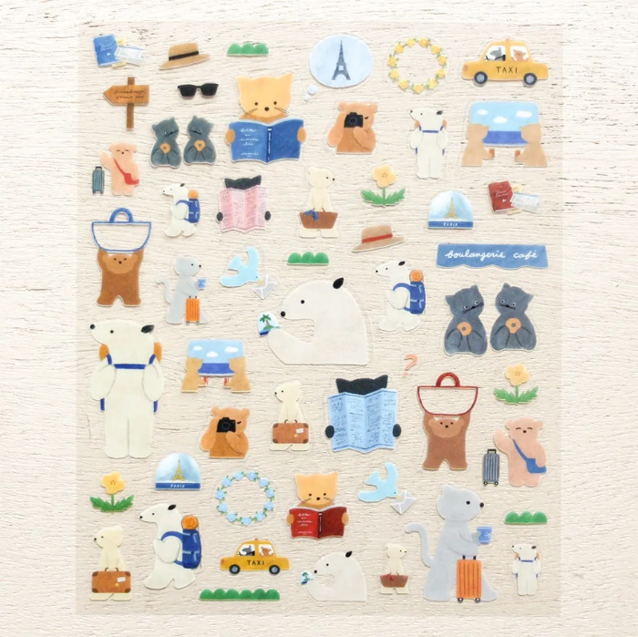 Mariko Fukuoka clear sticker sheet titled 'Let's Go On A Trip,' featuring playful travel-themed illustrations of luggage, maps, and cute characters, Japanese stationery perfect for decorating planners, journals, and scrapbooks.