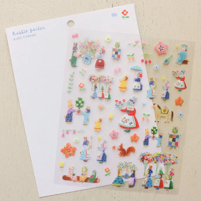 Aiko Fukawa clear sticker sheet titled 'Rabbit Garden,' featuring charming illustrations of rabbits among flowers and garden elements, Japanese stationery perfect for decorating planners, journals, and scrapbooks.