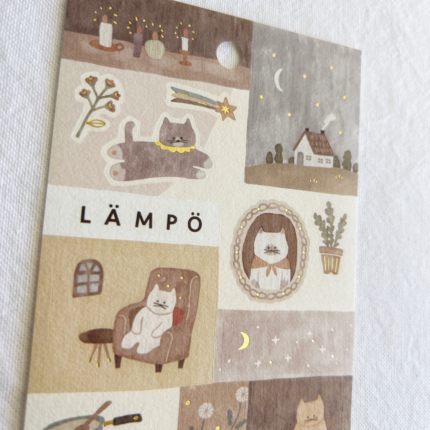 Mind Wave Lampo - Cat and Night sticker sheet. Ideal for decorating journals, planners, scrapbooks, and letters, these stickers add a touch of nighttime charm and feline enchantment to any project.