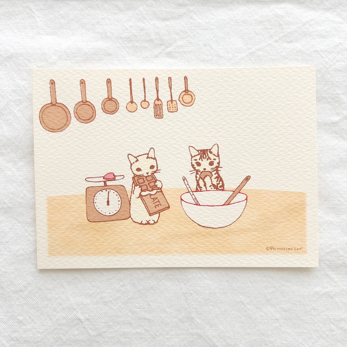 Pottering Cat Postcard - Making Chocolate