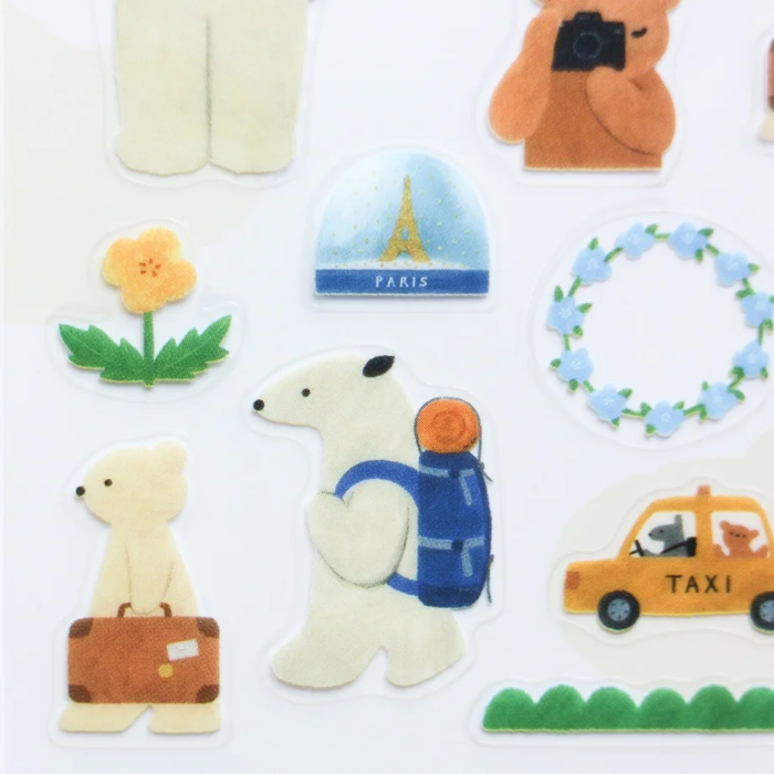 Mariko Fukuoka clear sticker sheet titled 'Let's Go On A Trip,' featuring playful travel-themed illustrations of luggage, maps, and cute characters, Japanese stationery perfect for decorating planners, journals, and scrapbooks.