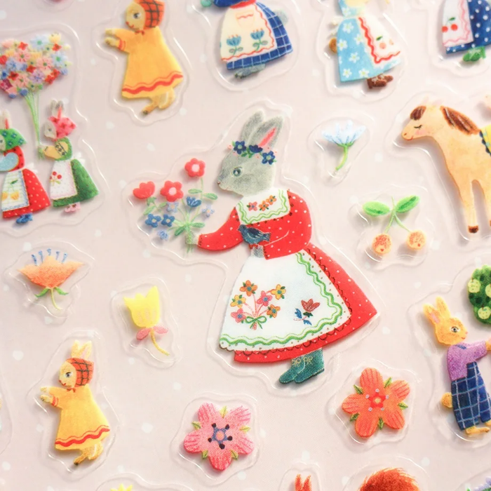 Aiko Fukawa clear sticker sheet titled 'Rabbit Garden,' featuring charming illustrations of rabbits among flowers and garden elements, Japanese stationery perfect for decorating planners, journals, and scrapbooks.