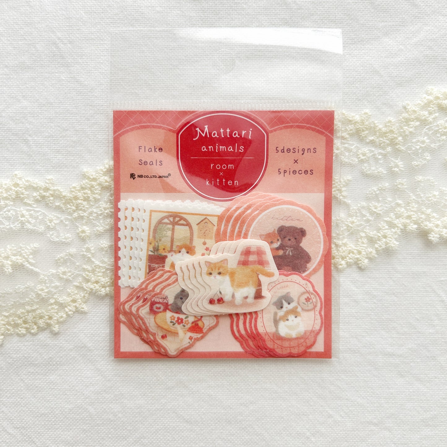 Flake stickers feature designs of adorable kittens leisurely playing with a stuffed bear, in a tea cup, with her kitten friend, and simply waving hello.