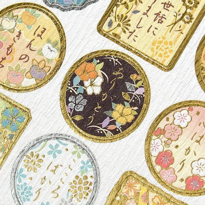 Japanese Sticker Sheet with decorative elements, featuring various cute and colorful designs ideal for embellishing planners, scrapbooks, and crafts.