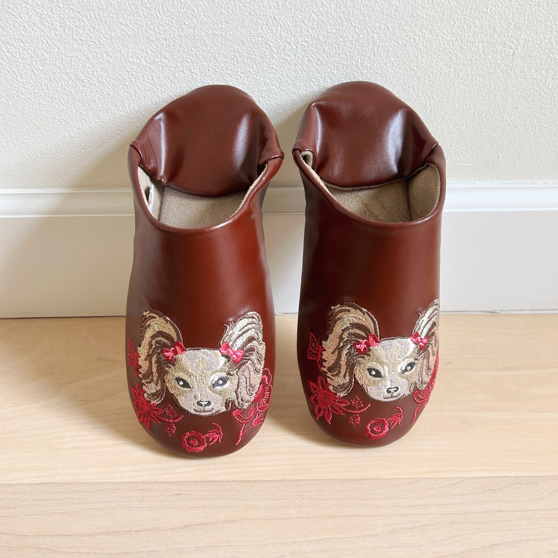 Chocolate brown house slippers with an embroidered dog