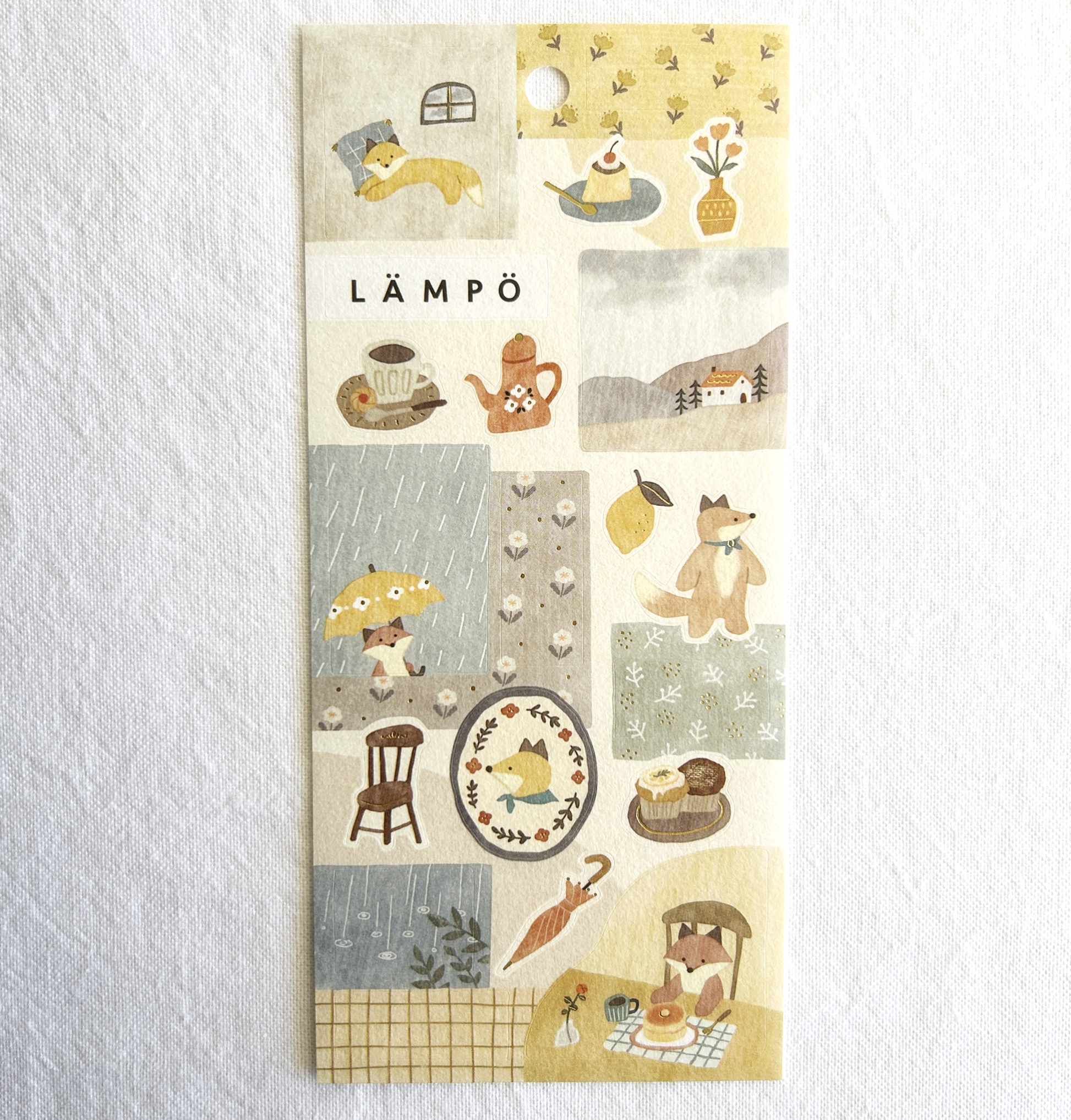 Mind Wave Lampo - Fox and Rain sticker sheet. Perfect for adding a relaxed, cozy touch to journals, planners, and scrapbooks.