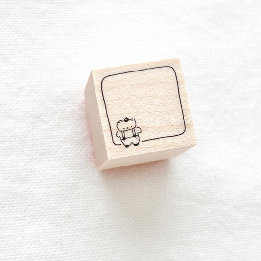 Wooden stamp block with a bear design 