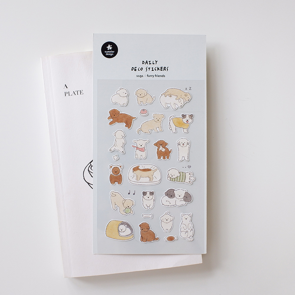 Pack of deco stickers with cute dog illustrations on a white background
