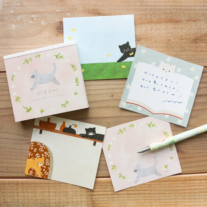 Mariko Fukuoka memo pad titled 'Meow,' featuring adorable cat illustrations, Japanese stationery perfect for cat lovers to add a cute touch to notes, planners, and journals.