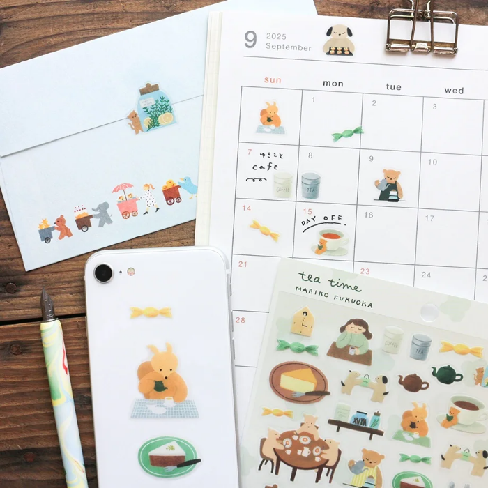 Mariko Fukuoka clear sticker sheet titled 'Tea Time,' featuring charming tea-themed illustrations with teacups, desserts, and cozy elements, Japanese stationery ideal for decorating planners, journals, and scrapbooks.