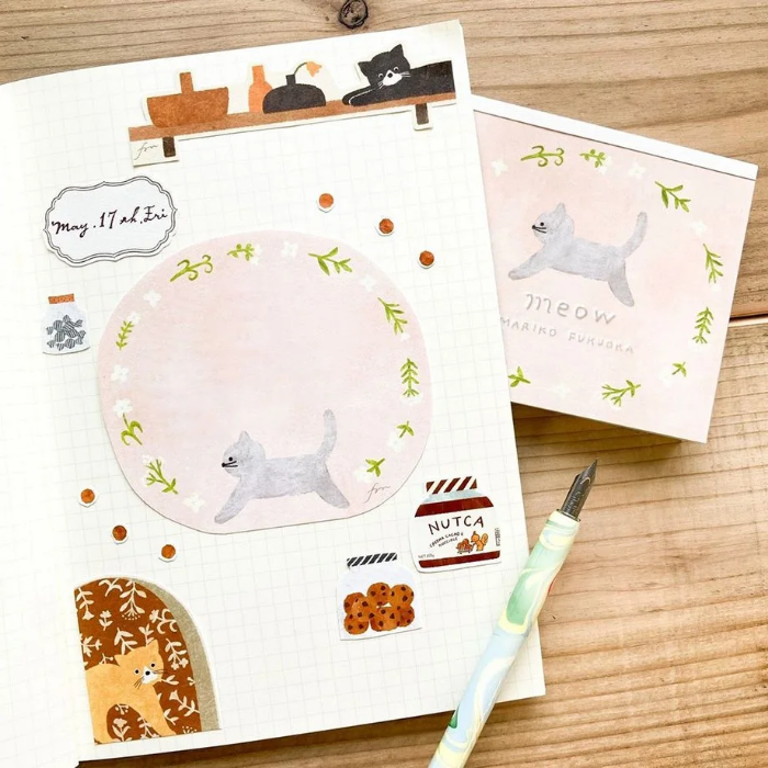 Mariko Fukuoka memo pad titled 'Meow,' featuring adorable cat illustrations, Japanese stationery perfect for cat lovers to add a cute touch to notes, planners, and journals.