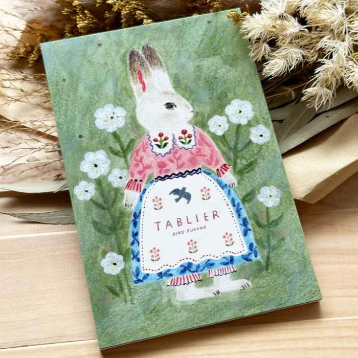 Aiko Fukawa postcard booklet titled 'Tablier,' featuring delightful illustrations of animals, flowers, and everyday scenes, Japanese stationery with a whimsical and artistic style.