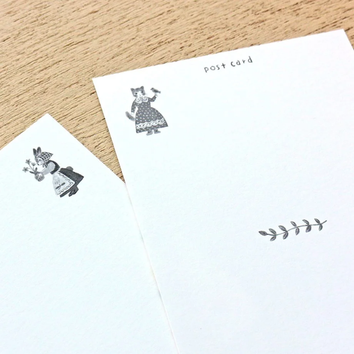 Aiko Fukawa postcard booklet titled 'Little Fluffy Friends,' featuring charming, whimsical illustrations of cute animals, Japanese stationery with adorable, collectible designs.