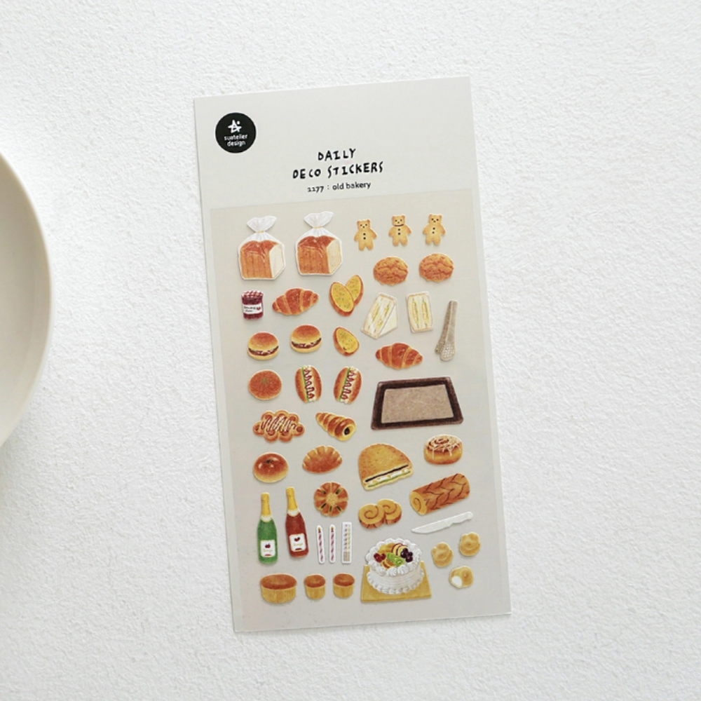 Sheet of bakery-themed stickers on a white background