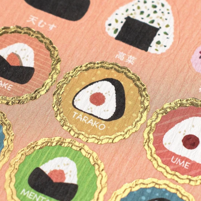 Japanese Sticker Sheet featuring cute onigiri rice ball designs, perfect for adding a touch of kawaii food art to planners, journals, and craft projects.